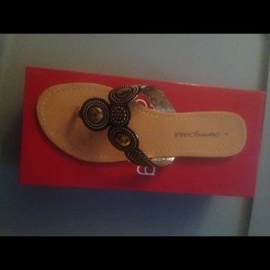 Brown/gold flip flops worn x1