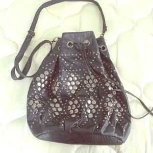 Large black studded bucket bag
