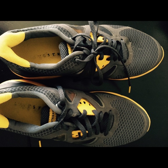 Black and yellow Nike Live Strong Shoes