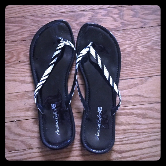 Zebra strap flip flops