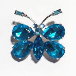 Bright blue butterfly pin