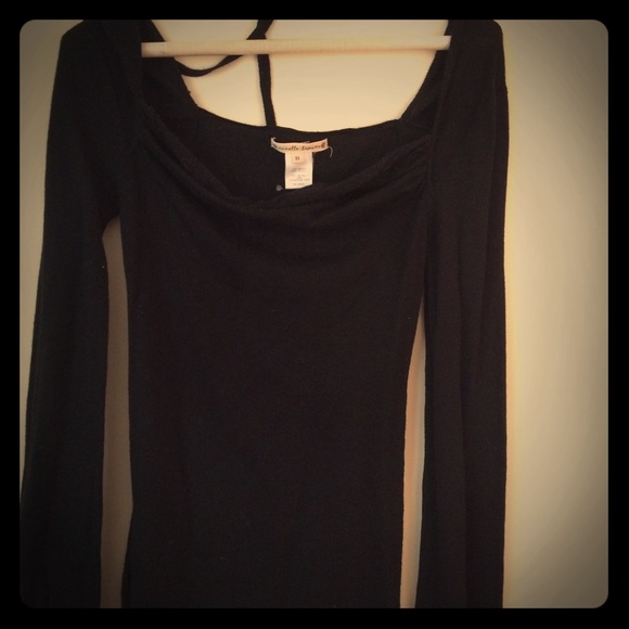 Black long sleeve top with dip in front and back