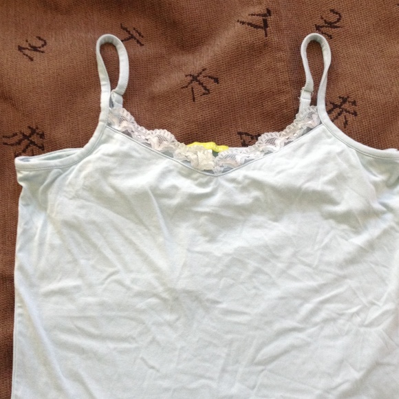 Tank top w/ front lace trim.