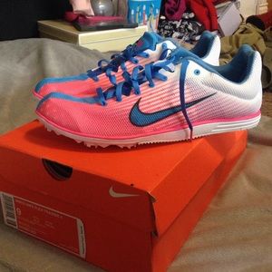 Nike running spikes; never worn before