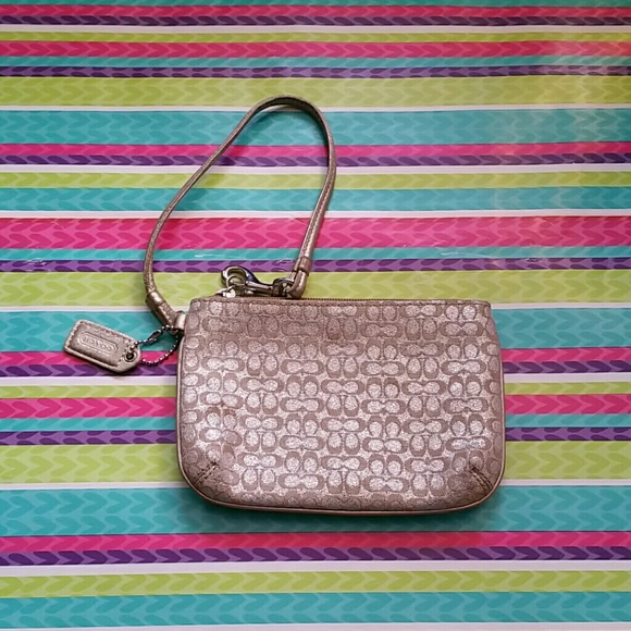 Gold coach wristlet