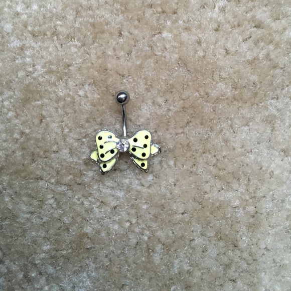 Yellow bow belly button ring