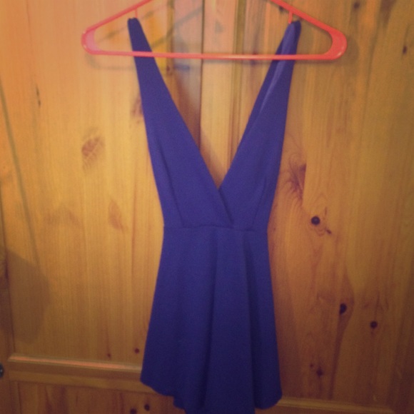Low v neck baby doll dress in neon blue!
