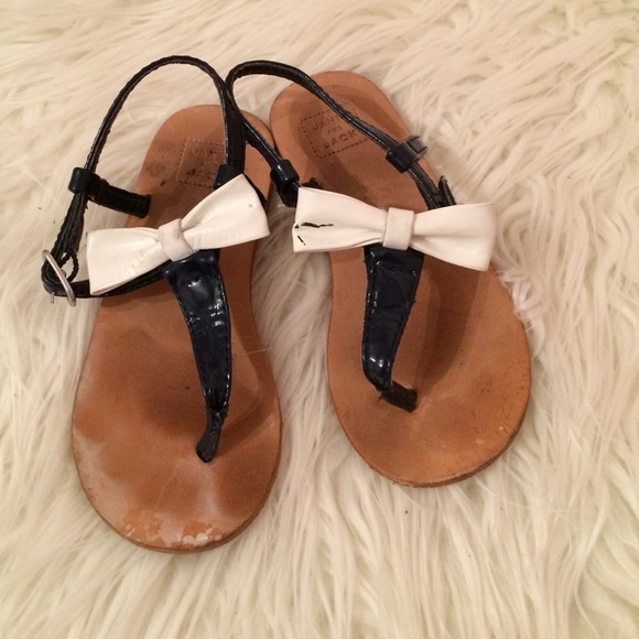 Blue and White leather bow sandals.