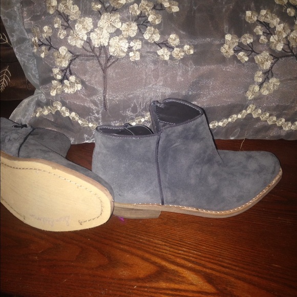 Below the ankle bootie boots.