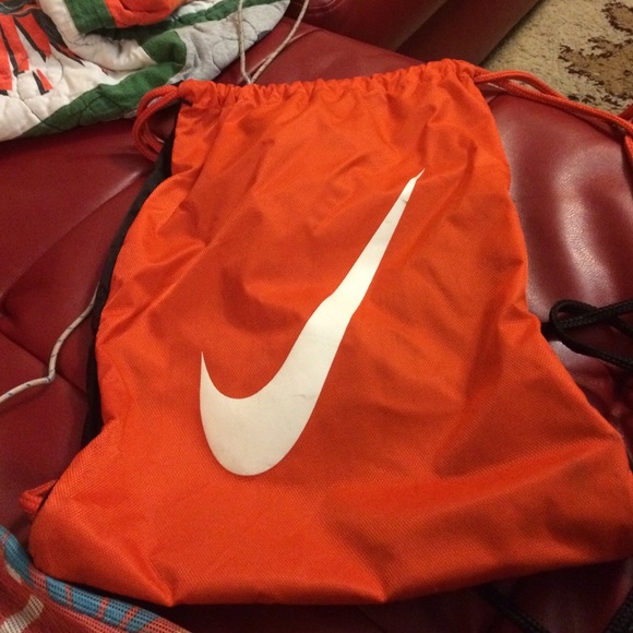 Orange draw string back pack