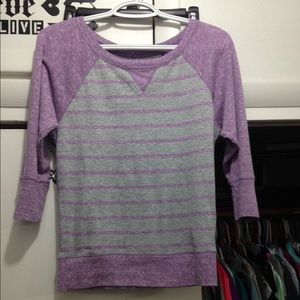 Purple and gray 3/4 length shirt.