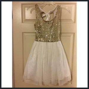 Darling bow-back sequin top dress.