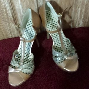 Tan with snake skin design never worn.