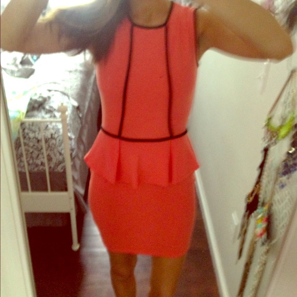 Coral and black peplum dress