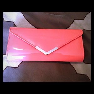Aldo peach clutch