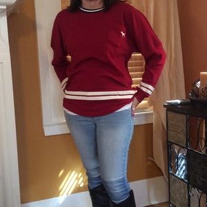Maroon colored sweatshirt