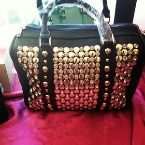 Sold Leather Handbag With Gold Studs.