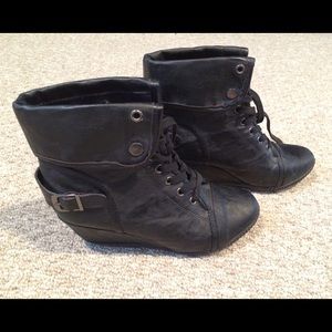 Bucco black wedge booties