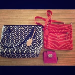 Two Coach Purses and a Coach wallet.