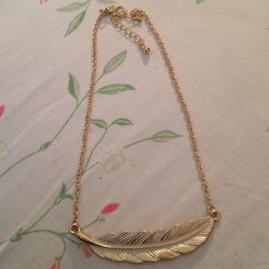Gold feather necklace