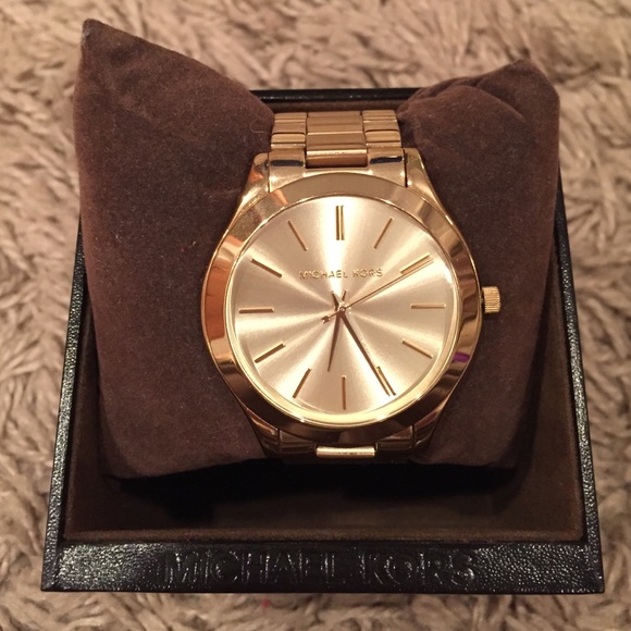 Michael Kors Accessories - Michael Kors woman's runway gold dial watch