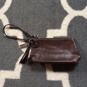 Brown leather coach clutch