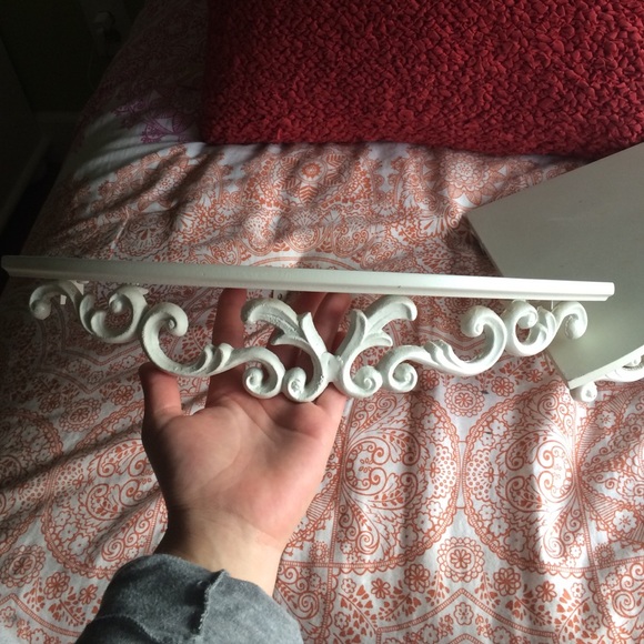 cute creme colored corner shelves