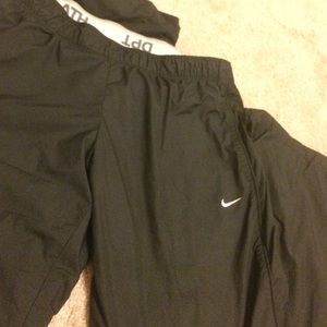Nike Woman's Black Mesh Lined Wind Track Pants
