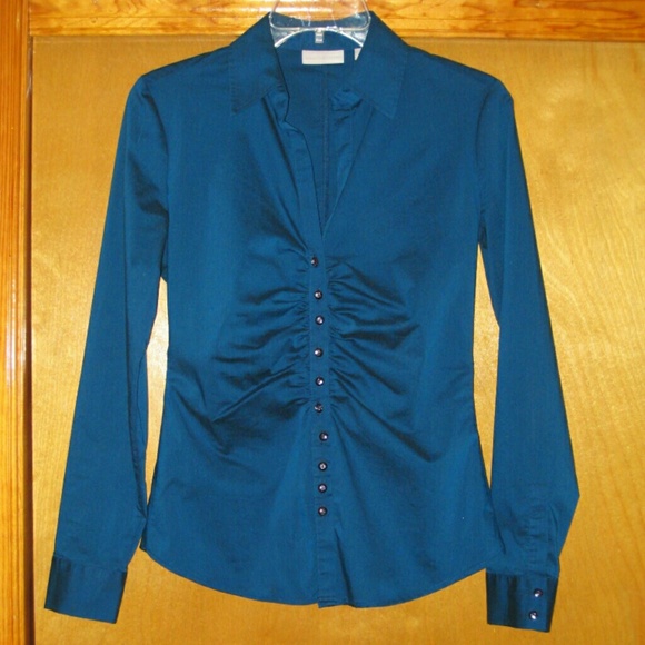 Fitted long sleeved dark teal blouse