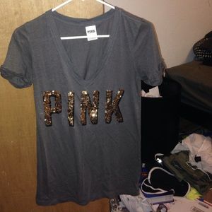 Sparkly t-shirt. Gold, black, and grey.