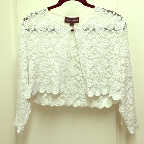 Connected white cardigan.