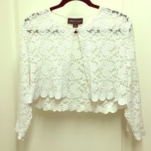 Connected white cardigan.