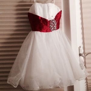 Formal white dress with red bust.