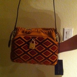Burberry little crush RVT ABKOA. Copper orange.