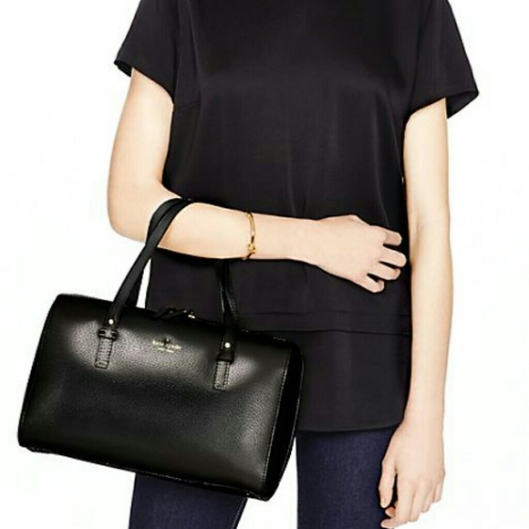 SOLD. New Kate Spade handbag and wallet.