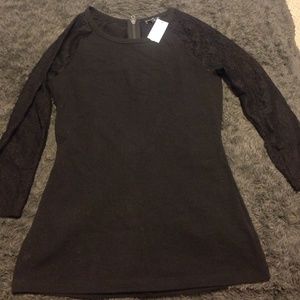 Brand new Black express top with lace sleeves