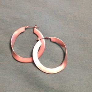 Silver hoops with a "twist"