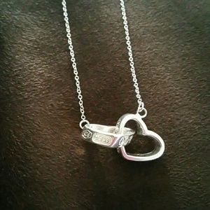 Interlocking heart pendant