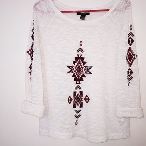 A tribal print embroidered jersey.
