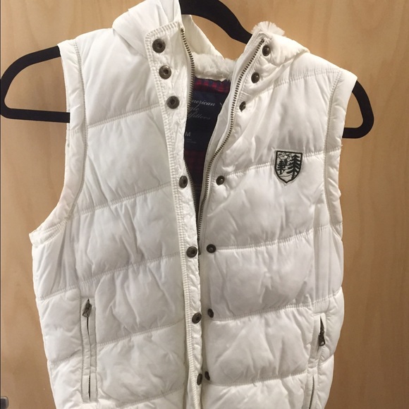 White vest w/ fur inside.