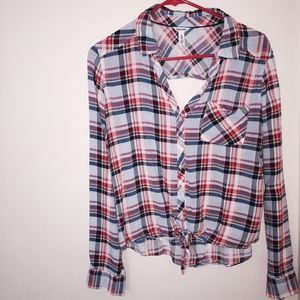 An open back mid waist button up plaid top.