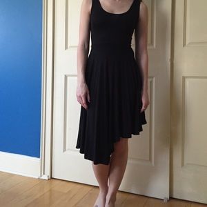 Black Dress with Uneven Hem and Decorative Back