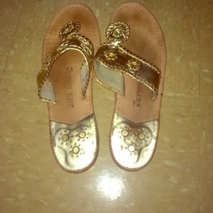 gold Jack Rogers sandals.