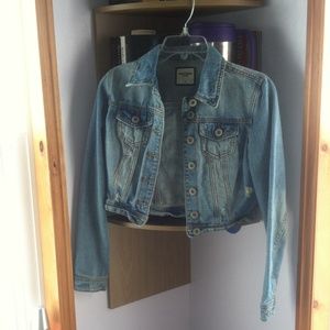 Distressed denim jacket