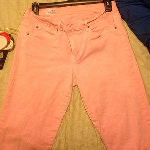 Neon pink skinny jeans