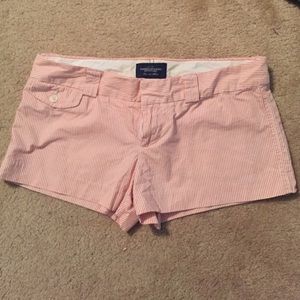 Coral and white striped shorts