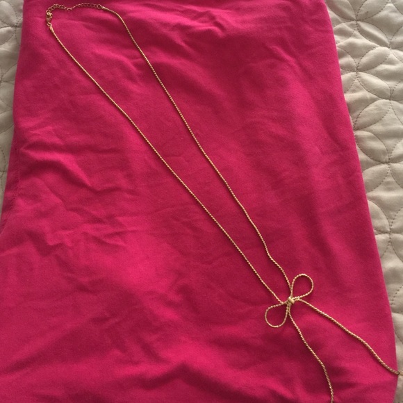 Gold bow necklace