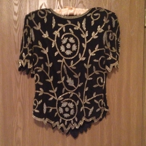 Beaded top.  🚬 no returns no trades