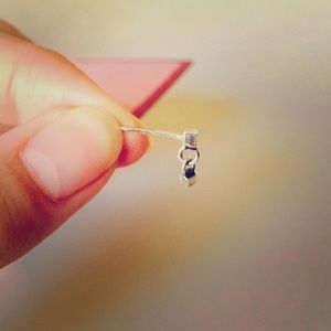 Tiny square earing. Sliver. .