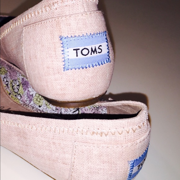 Toms blush colored flats.